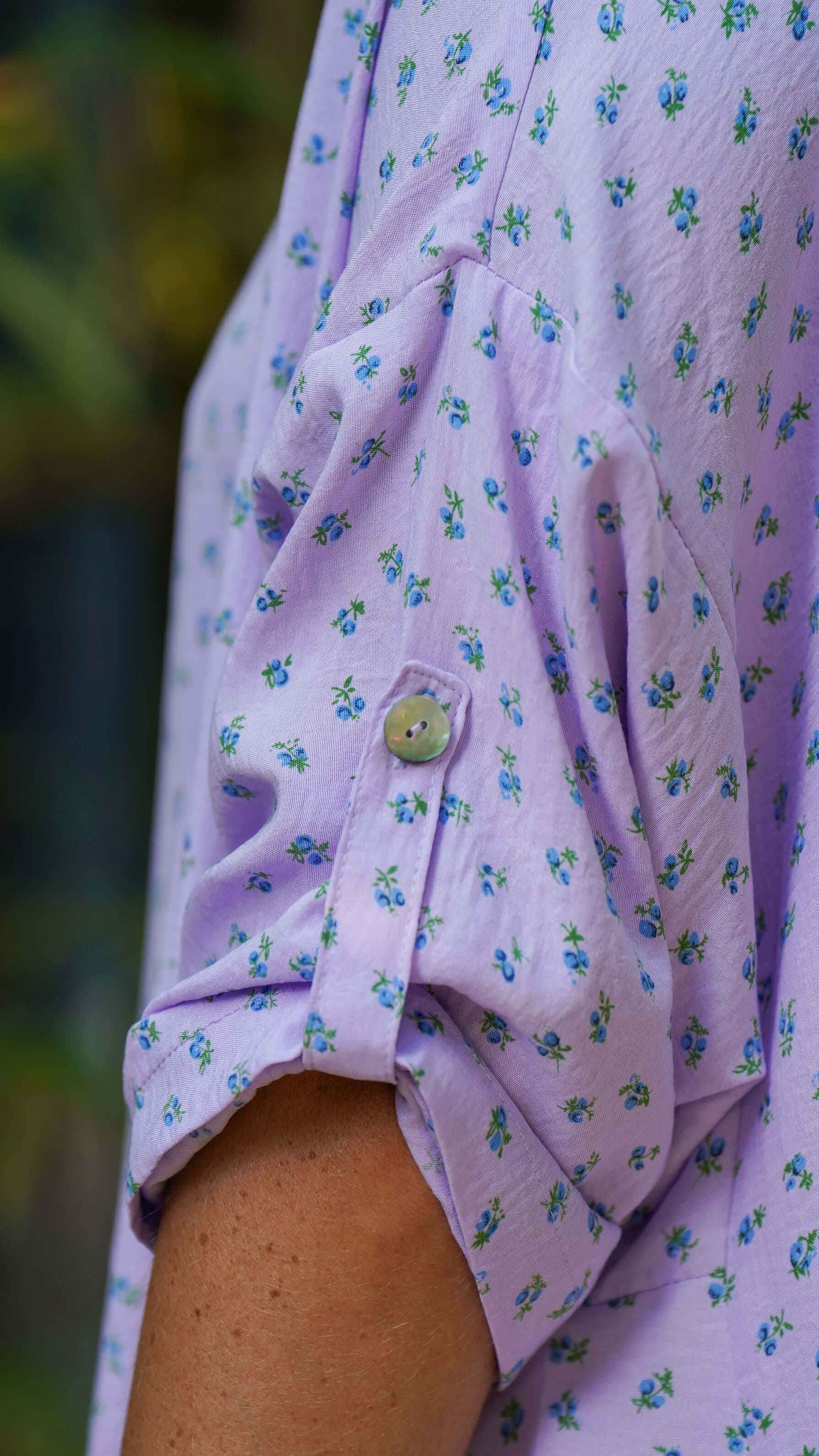 Lilla midikjole med lommer