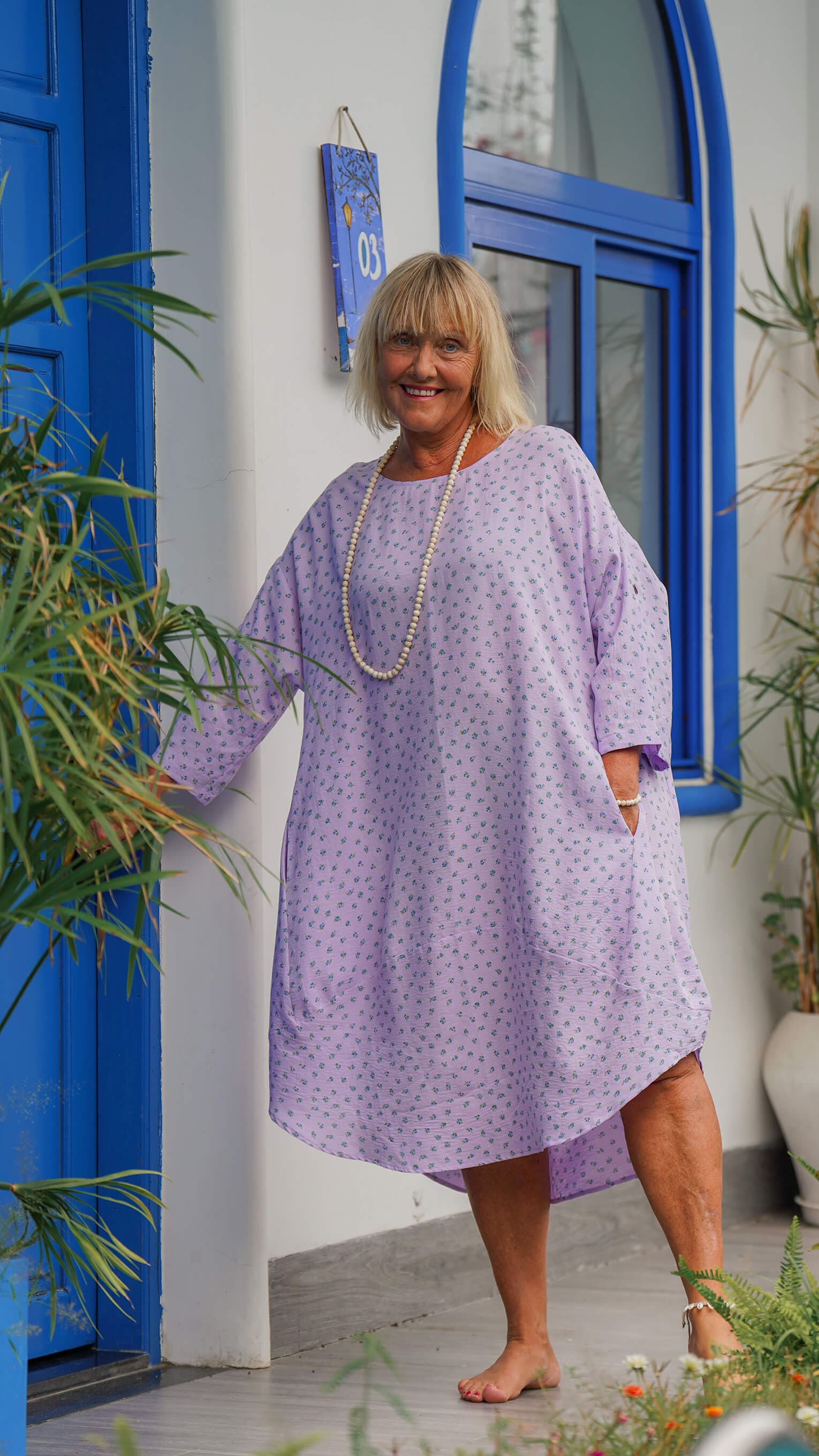 Lilla midikjole med lommer