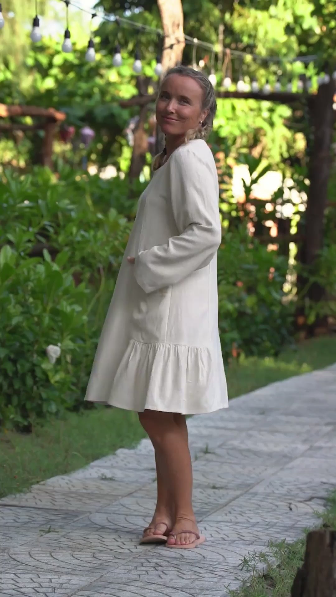 Kremfarget kort linkjole med lommer